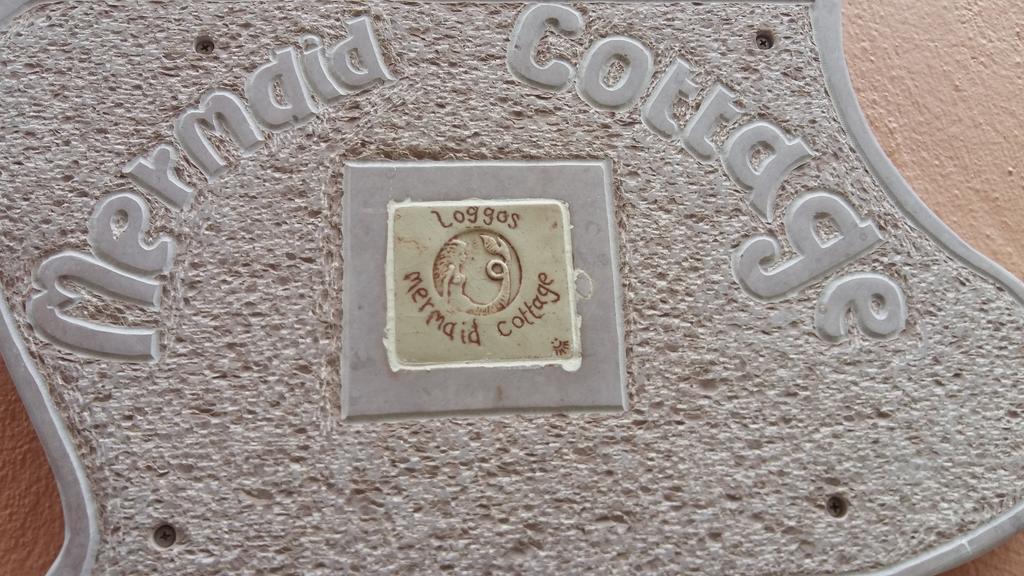 Mermaid Cottage Longos  Bagian luar foto